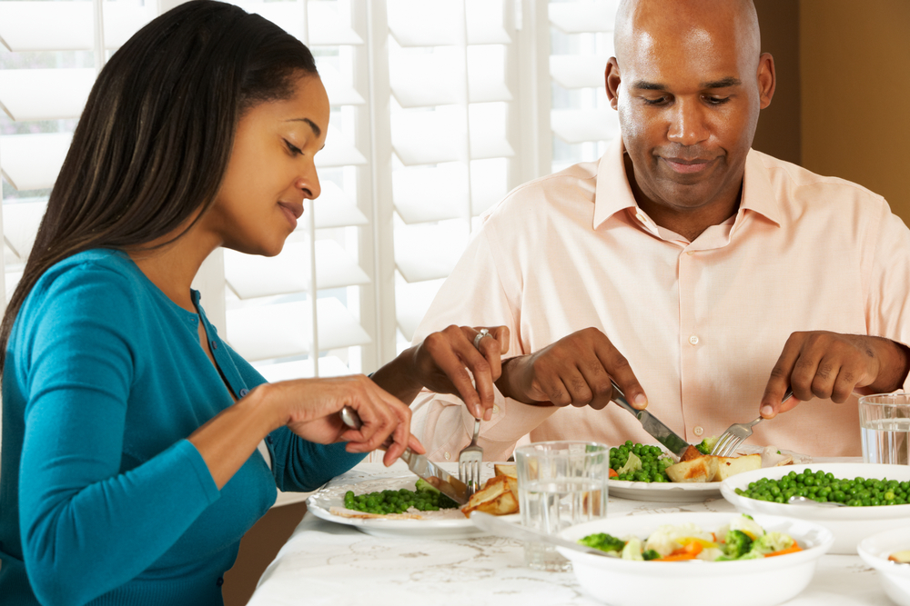 couple, enjoying healthy meal at home, dinner table.